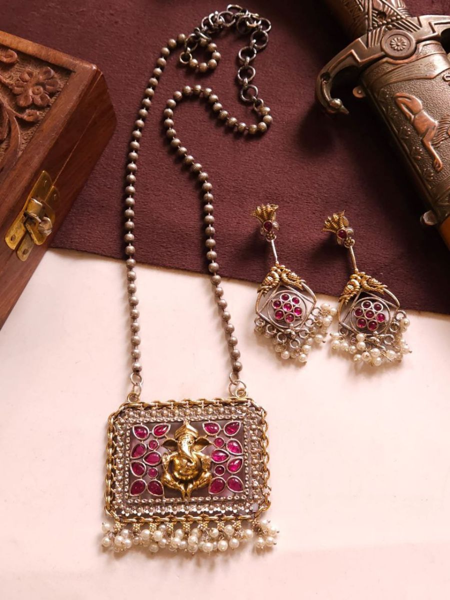 Buy Dual Tone Rani Pink Stone Ganesha Pendant Chain Necklace - TheJewelbox