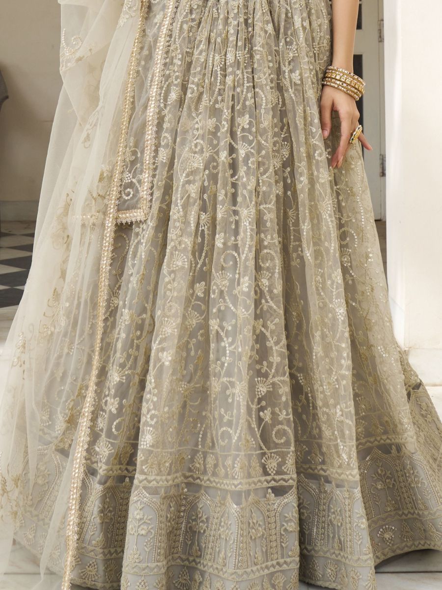 Ivory Thread and Sequins Work Net Engagement Lehenga