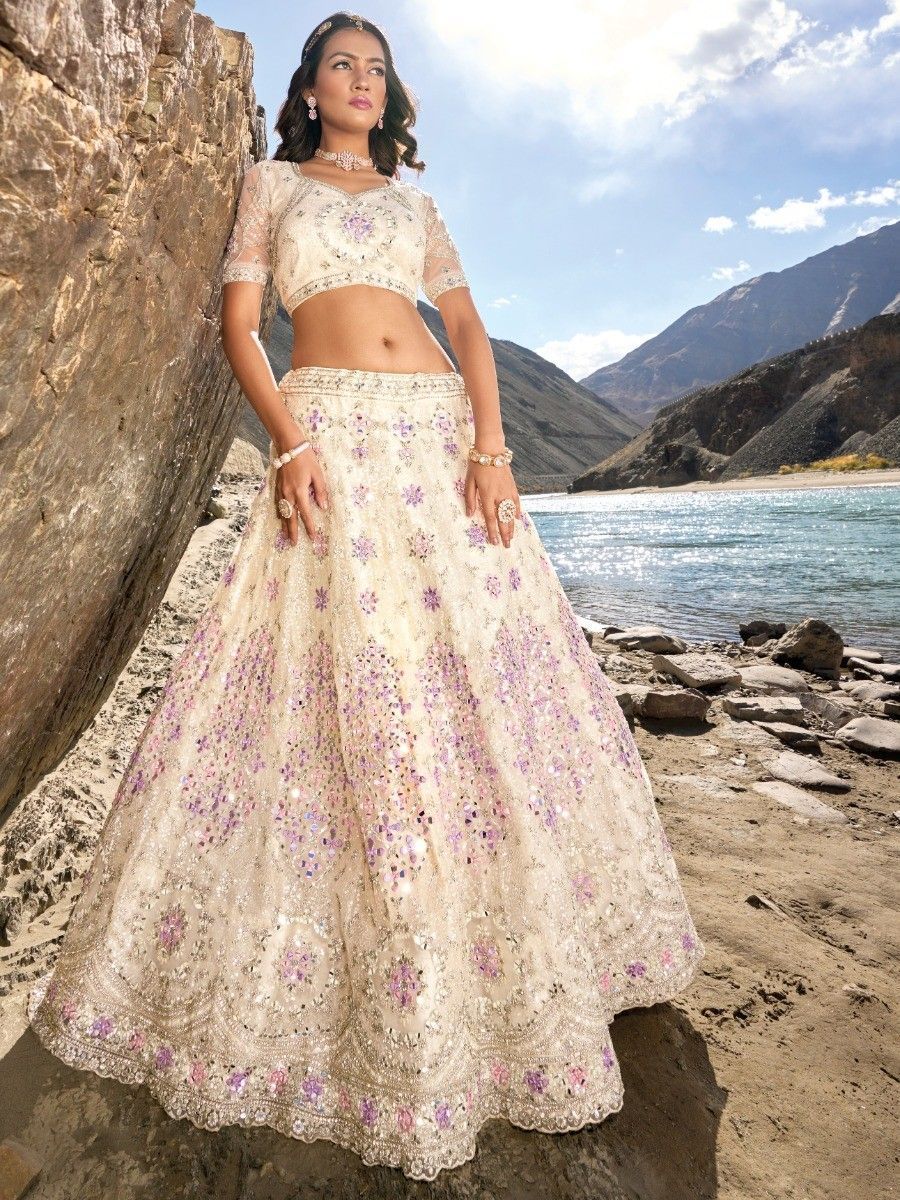 Ivory and Purple Mirror Work Engagement Net Lehenga Choli