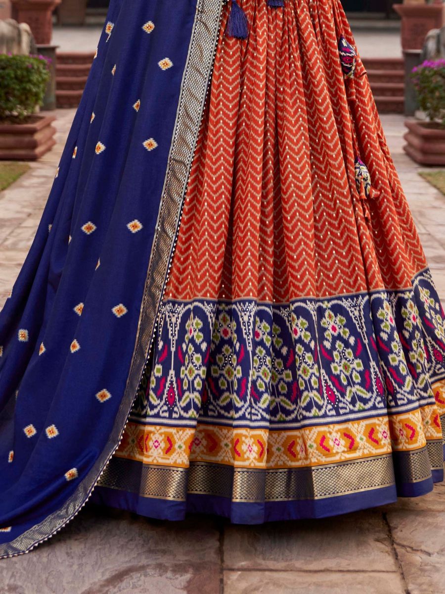 Orange and Blue Patola Printed Wedding Silk Lehenga - Flair